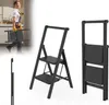 A collage of images showing a black folding step stool in different states and contexts. Náhled obrázku produktu