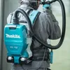A person wearing a backpack vacuum cleaner. Náhled obrázku produktu