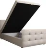 A beige upholstered bed frame with the mattress base lifted to reveal storage space underneath. Produktbild-Vorschau