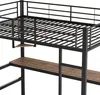 Close-up of a black metal loft bed with a wooden desk. Podgląd zdjęcia produktu