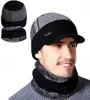 A man wearing a winter hat and scarf set. Produktbild-Vorschau
