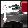 A close-up view of a jigsaw's blade and clamp mechanism, with an arrow indicating vertical movement. Produktbild-Vorschau