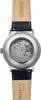 The back of a watch with a visible movement and a leather strap. Produktbild-Vorschau