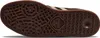 The underside of a brown sneaker is shown against a white background. Produktbild-Vorschau