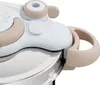 A close-up view of the lid and handle of a pressure cooker. Voir les images du produit