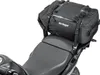 A black Kriega drypack is mounted on the rear seat of a motorcycle. Produktbild-Vorschau