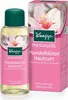 A bottle of Kneipp massage oil and its packaging are shown against a white background. Voir les images du produit