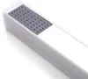 A close-up shot of a modern, rectangular hand shower head with a silver finish and a gray perforated spray plate. Podgląd zdjęcia produktu