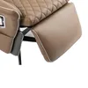 A close-up of a tan leather massage chair with a quilted seat and extended footrest. Produktbild-Vorschau