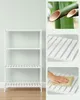 A collage showing a white bamboo shelf unit and close-ups of bamboo and the shelf's slats. Náhled obrázku produktu