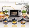 A modern kitchen counter with a microwave, food items, and decorative plants. Produktbild-Vorschau
