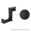 A black headphone hook holder is shown against a white background, with a close-up inset showing the texture of the material. Produktbild-Vorschau