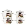 A set of four enamel pots with a mushroom motif, arranged in two stacks of two. Náhľad obrázku produktu