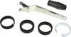 A set of accessories for an angle grinder, including a dust extraction cover and various rings. Náhled obrázku produktu