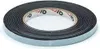 A roll of black sealing tape on a white background. Podgląd zdjęcia produktu