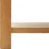 A close-up of a wooden table leg and surface. Náhled obrázku produktu
