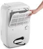 A hand is shown removing the filter from a white dehumidifier. Produktbild-Vorschau