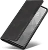 A black leather flip case for a smartphone is shown at an angle. Produktbild-Vorschau