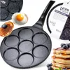 A collage of images showing a Vilde egg frying pan with 7 molds, along with cooked eggs and pancakes. Anteprima dell’immagine prodotto