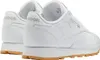 A close-up rear view of two white Reebok Classic Leather sneakers with gum soles. Produktbild-Vorschau