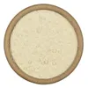 A top-down view of coconut flour in a wooden bowl. Podgląd zdjęcia produktu