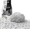 A bag of cat litter and a pile of cat litter. Produktbild-Vorschau
