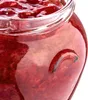 A close-up shot of a glass jar filled with red jam. Anteprima dell’immagine prodotto