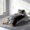 A bedroom scene with a bed dressed in a duvet cover featuring a large cat print. Produktbild-Vorschau