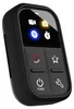 A black smart remote control with a screen displaying icons. Podgląd zdjęcia produktu