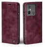 A burgundy flip case for a smartphone is shown from two angles, front and side. Produktbild-Vorschau