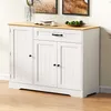 A white sideboard with a wooden top, placed on a wooden floor in front of a wall. Produktbild-Vorschau