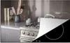 KitchenYeah© Herdabdeckplatte Ein Wasserkocher auf einem Produktbild-Vorschau 1