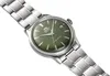 A silver watch with a green dial is shown against a white background. Produktbild-Vorschau