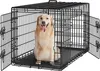 A golden retriever dog sits inside a black metal dog crate with its doors open. Produktbild-Vorschau