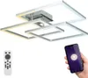A modern ceiling light fixture with a remote control and a smartphone displaying a light control app. Produktbild-Vorschau