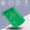 A green laser target plate with measurement markings and a crosshair is shown at an angle against a light gray background with marketing icons at the top. Anteprima dell’immagine prodotto