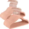 A stack of pink velvet hangers with rose gold hooks. Náhled obrázku produktu