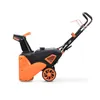 A side view of a snow blower on a white background. Podgląd zdjęcia produktu