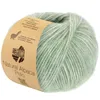 A ball of yarn with a paper label wrapped around it. Produktbild-Vorschau