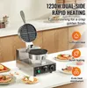 A commercial waffle maker is shown on a kitchen counter with waffles and toppings. Náhled obrázku produktu
