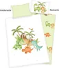 A flat lay of a duvet cover and pillowcase with a dinosaur theme. Náhled obrázku produktu