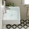 A modern bathroom sink with water running from the faucet. Anteprima dell’immagine prodotto