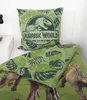 A close-up view of a Jurassic World themed pillow and duvet cover set on a bed. Produktbild-Vorschau