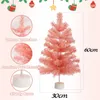 A pink artificial Christmas tree with descriptive callouts and dimensions. Anteprima dell’immagine prodotto