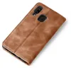 A brown leather flip case for a smartphone is shown against a white background. Produktbild-Vorschau