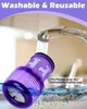 A purple vacuum cleaner filter being washed under a faucet. Produktbild-Vorschau