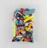 A clear, well-lit studio shot of a bag filled with assorted LEGO bricks against a white background. Podgląd zdjęcia produktu