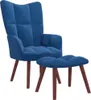 A blue velvet armchair with a matching ottoman, both supported by wooden legs, against a white background. Produktbild-Vorschau