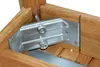 A close-up view of a metal bracket and bolts connecting wooden components, likely part of a table or furniture assembly. Produktbild-Vorschau