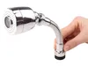 A hand holding a chrome faucet sprayer attachment with a flexible hose. Náhľad obrázku produktu